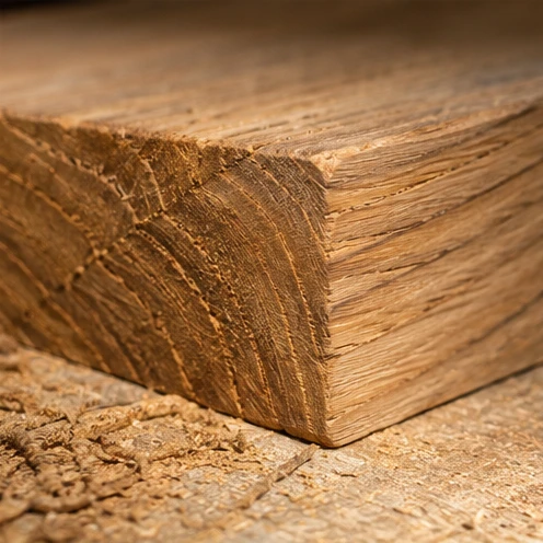 Macro detail of natural teak grain and raw timber